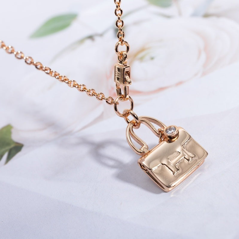HERMES AMULETTE CONSTANCE PEDANT PINK GOLD NECKLACE