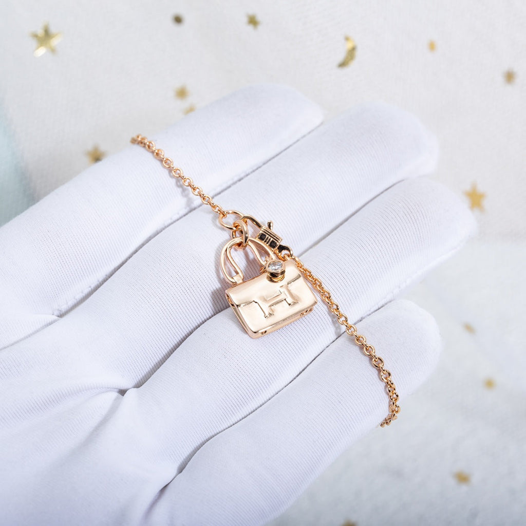 HERMES AMULETTE PEDANT PINK GOLD NECKLACE