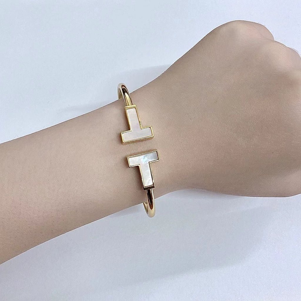 TIFFANY T WIDE MOP OPEN BRACELET