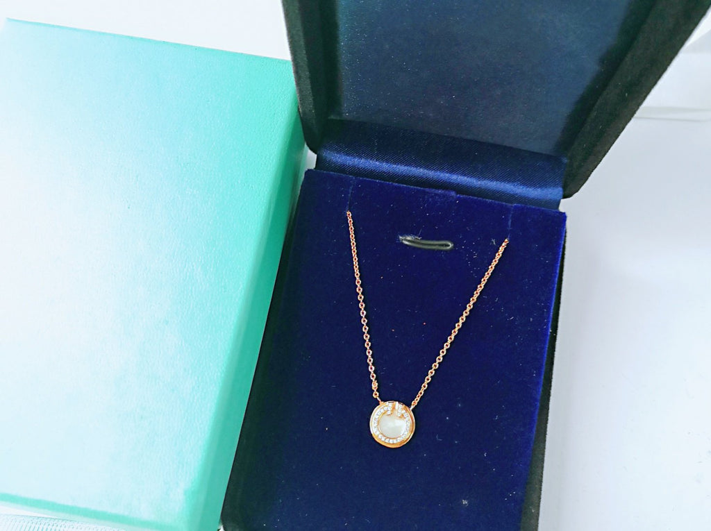 TIFFANY DIAMOND AND MOTHER PEARL CIRCLE NECKLACE PENDANT