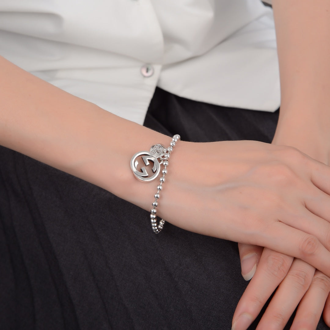GUCCI GG BOULE PLATED SILVER CHARM BRACELET