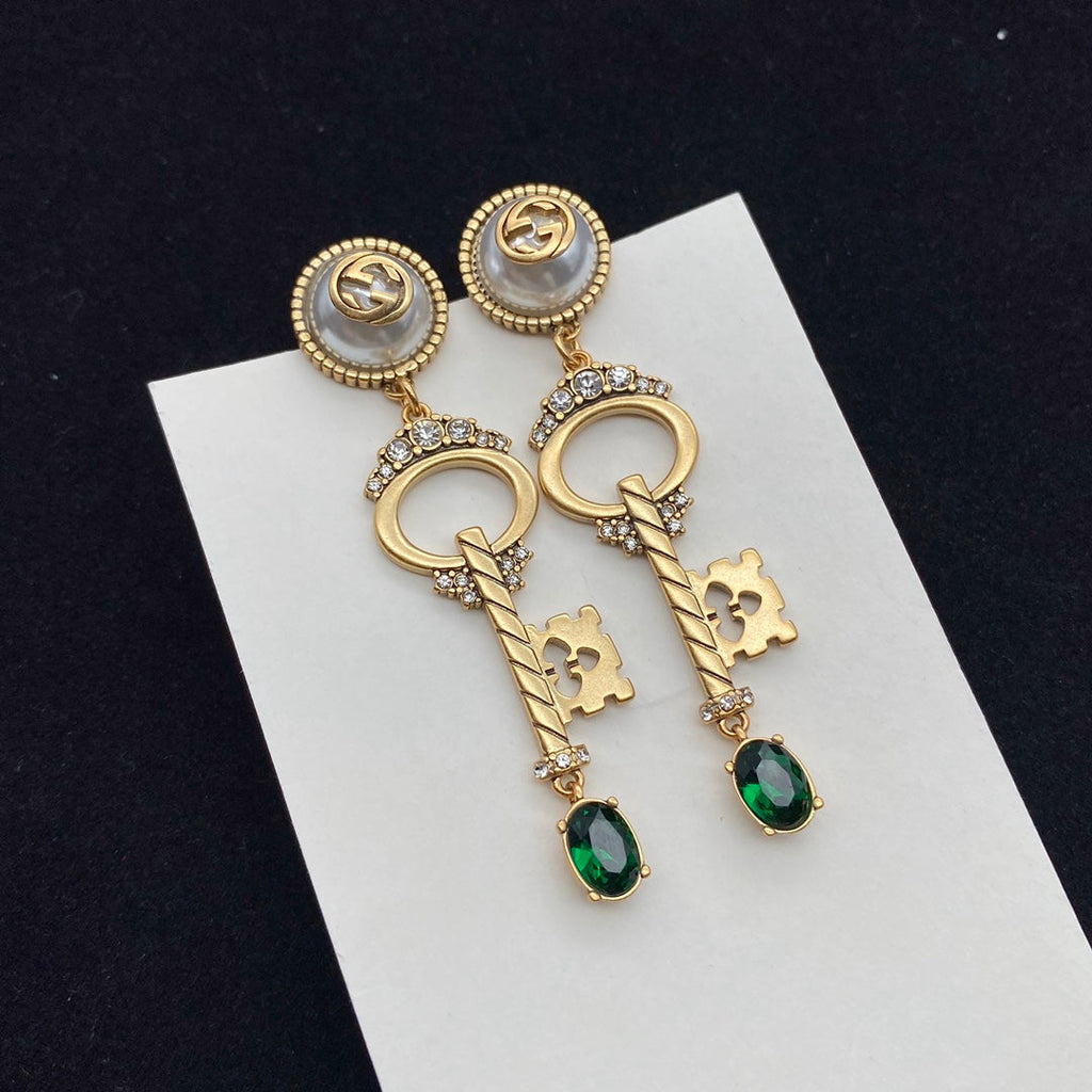 GUCCI KEY SHAPED DANGLE GG EARRING
