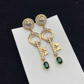 GUCCI KEY SHAPED DANGLE GG EARRING