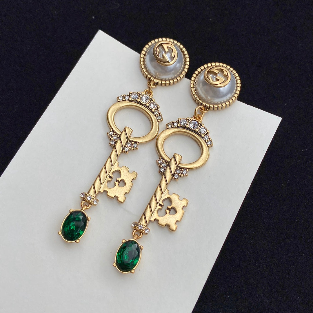GUCCI KEY SHAPED DANGLE GG EARRING
