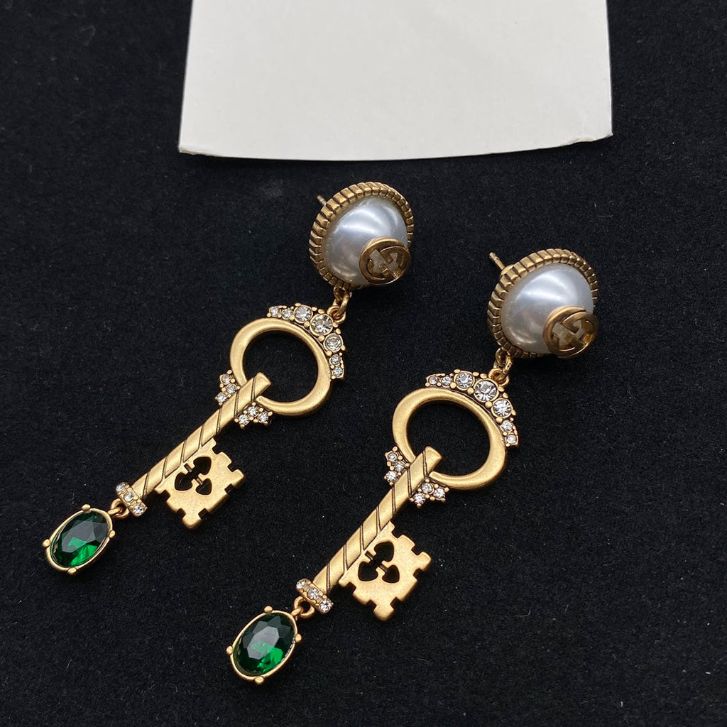 GUCCI KEY SHAPED DANGLE GG EARRING