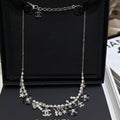 Chanel 2026 Silver Double C Black Flower Pearl Tassel Necklace