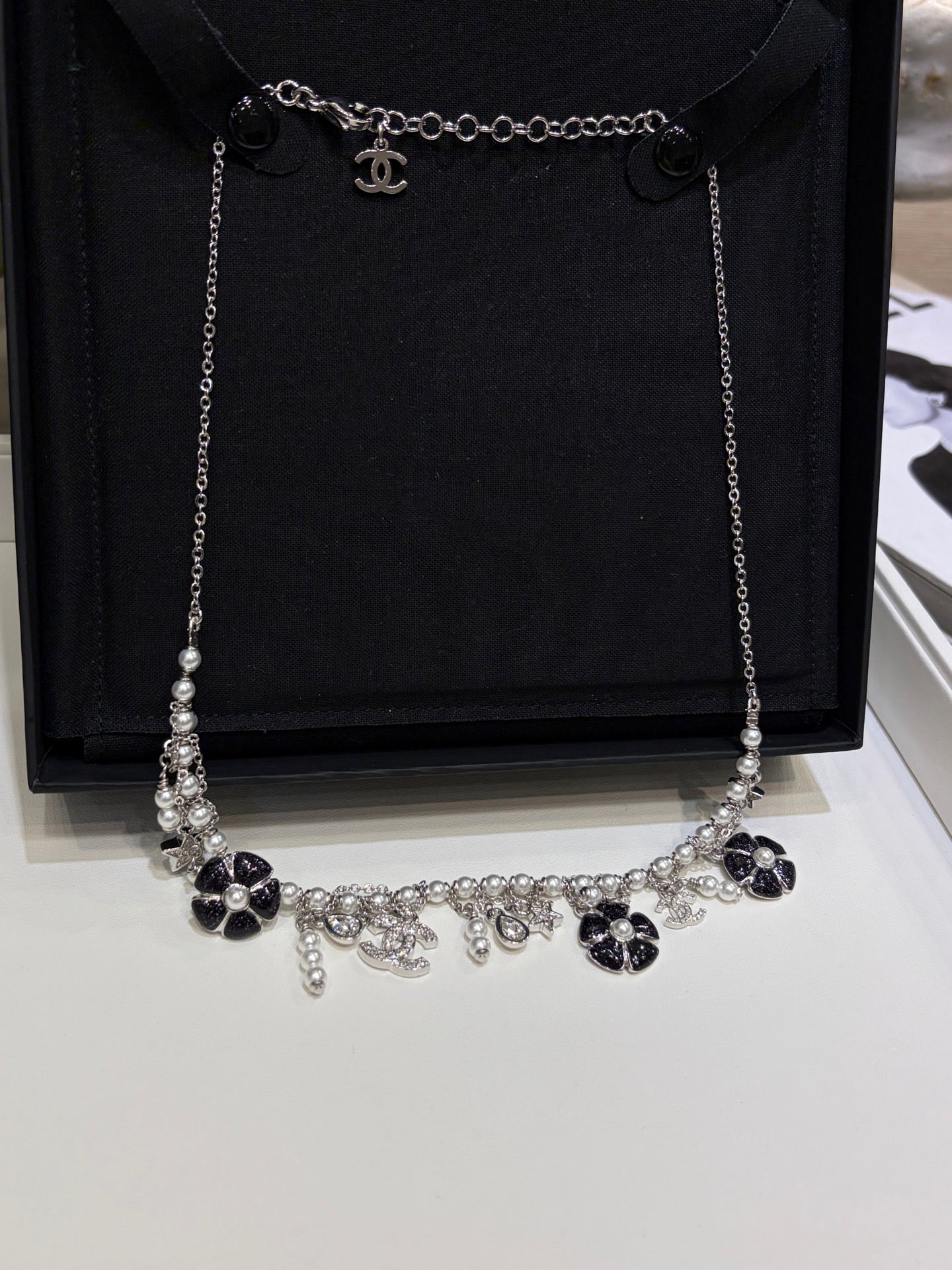 Chanel 2026 Silver Double C Black Flower Pearl Tassel Necklace