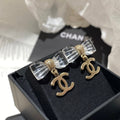 Chanel Transparent Acrylic Bow Gold Earrings