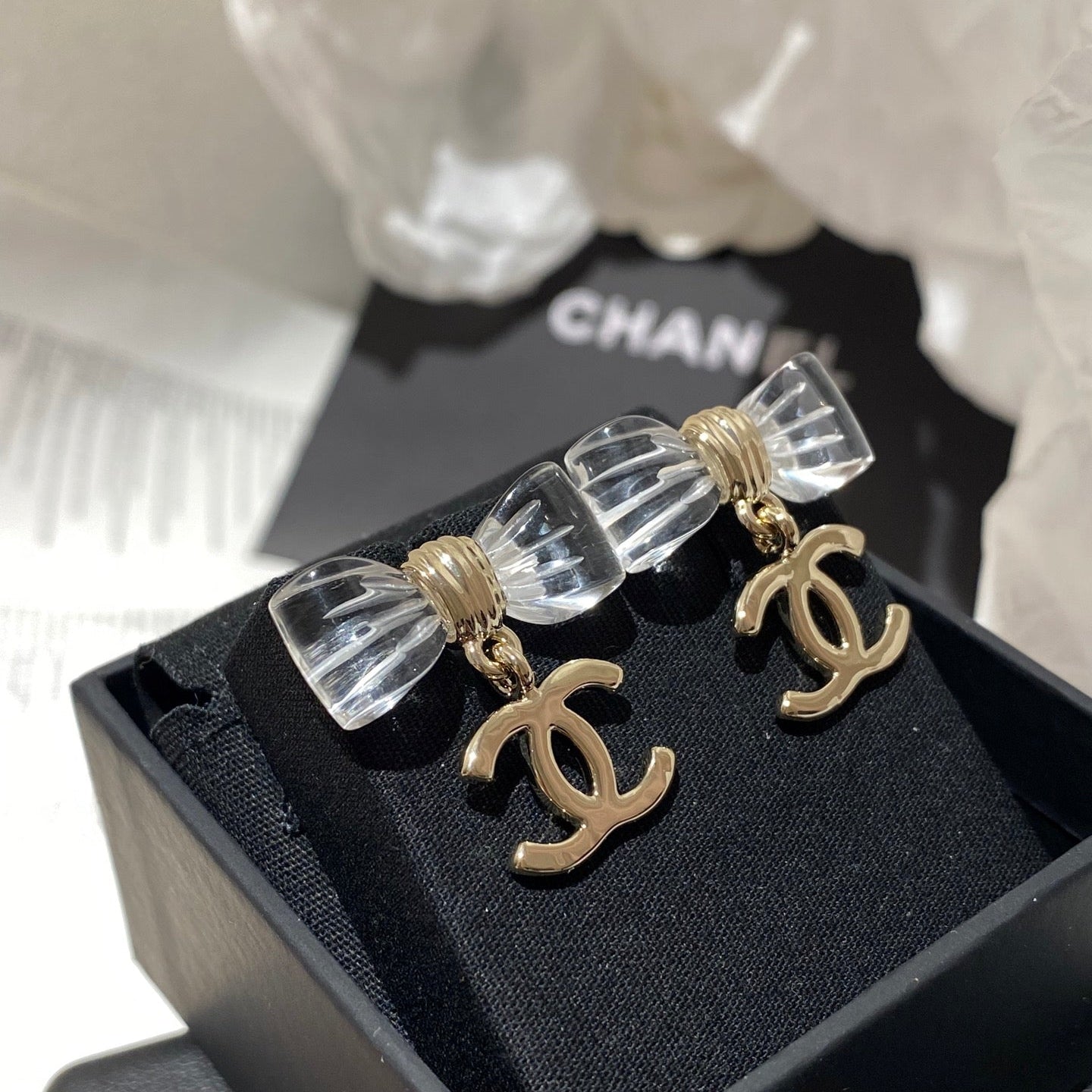 Chanel Transparent Acrylic Bow Gold Earrings