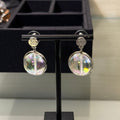 Chanel 2026 Transparent Iridescent Crystal Ball Planet Silver Button Double C Earrings